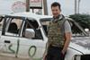 John Cantlie Posing w FSA Vehicle Aleppo 11-11-2012_crop2-1