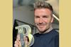 Beckham with Award