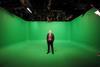 Michael Wilson in front of UTV's green screen