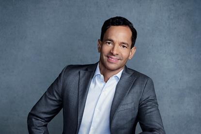 George Cheeks seated large