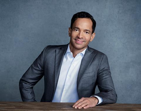 George Cheeks seated large