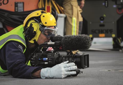 Chris Terrill filming on flight deck on board HMS Queen Elizabeth