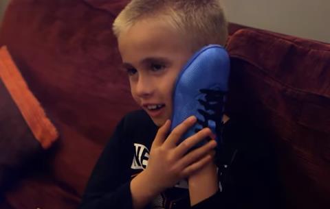 Aj gets football boots