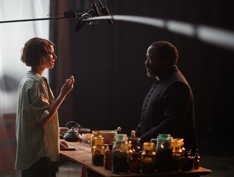 Jessie Buckley (Juliet) and Lucian Msamati (Friar) filming Romeo & Juliet at the National Theatre. Photo by Rob Youngson