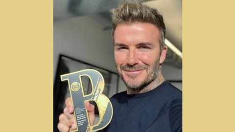 Beckham with Award
